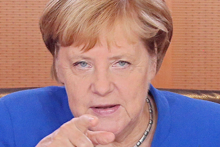 Fotó: AFP Merkel szerint a német egységfolyamat nem ért véget