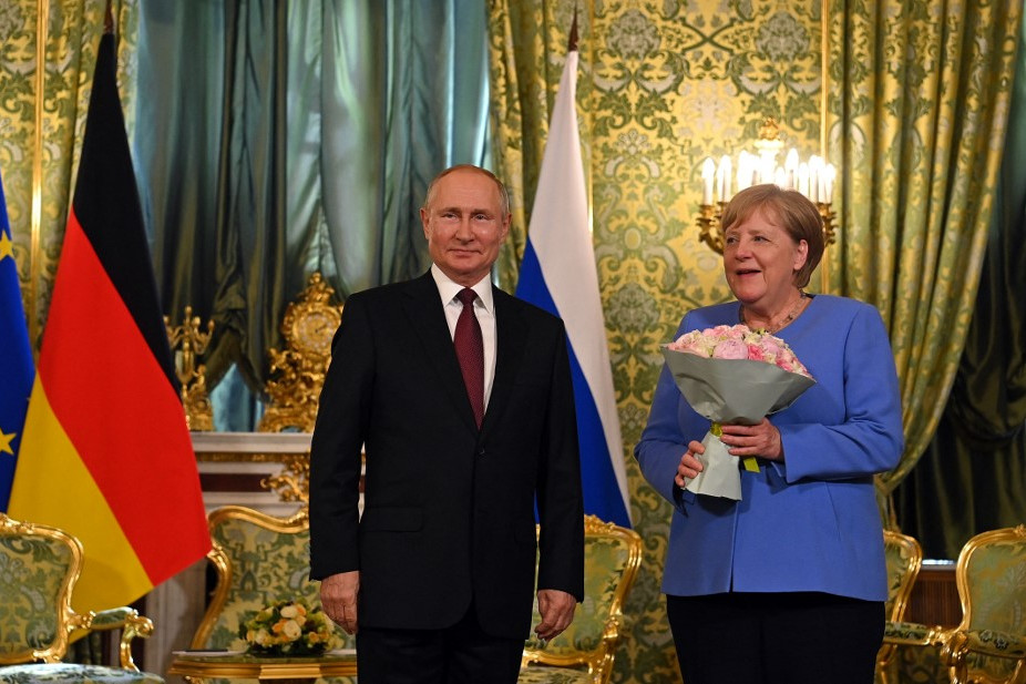 Fotó: AFP/Sputnik/Evgeny Odinokov Vlagyimir Putyin orosz elnök és Angela Merkel német kancellár találkozója a Kremlben