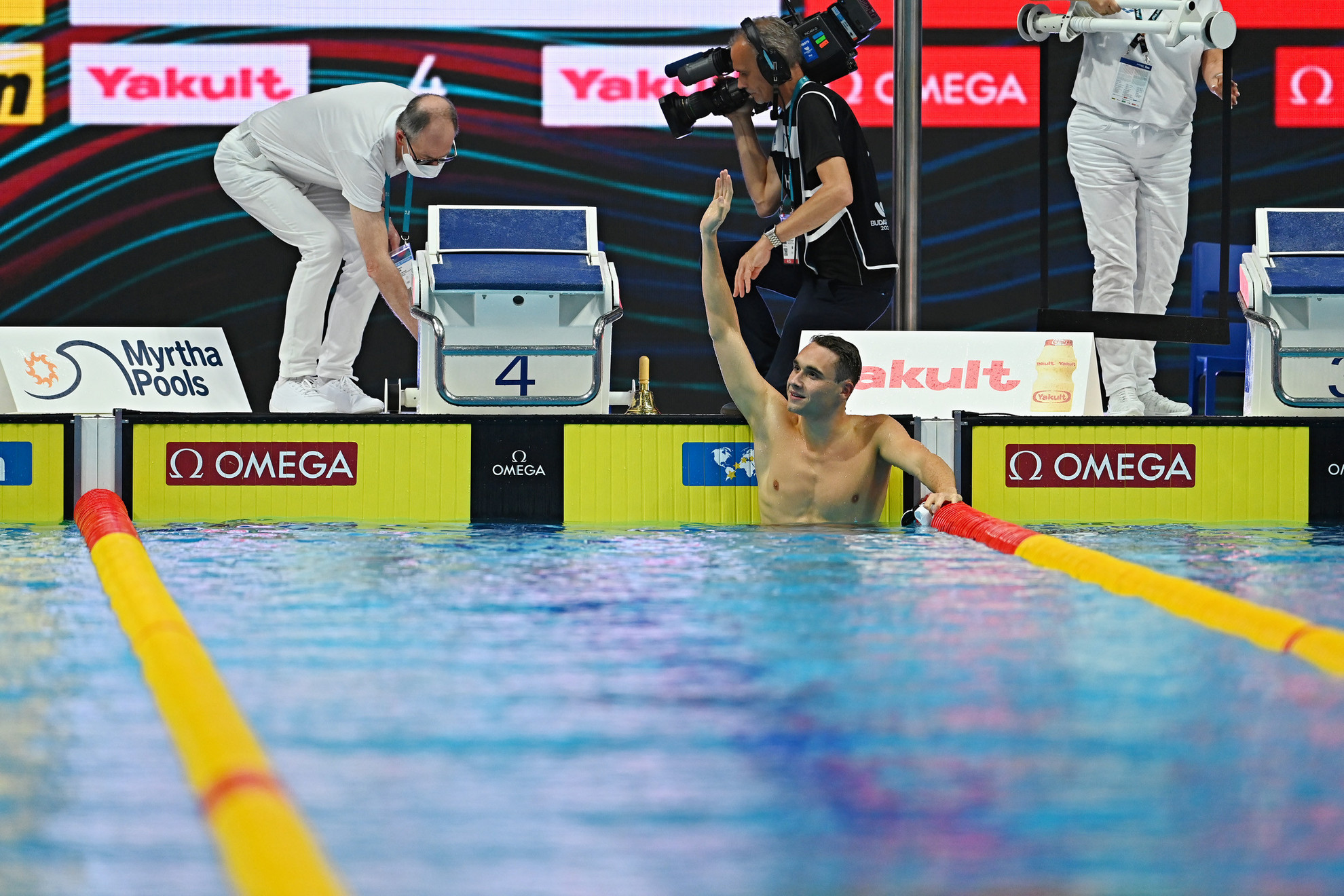 Milák Kristóf aranyérmet nyert 100 méter pillangón pénteken a Duna Arénában zajló úszó-világbajnokságon.