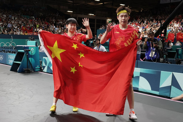 Fotó: Credit WangDongZhen / XINHUA / Xinhua via AFP Kínai aranyérem asztalitenisz vegyes párosban