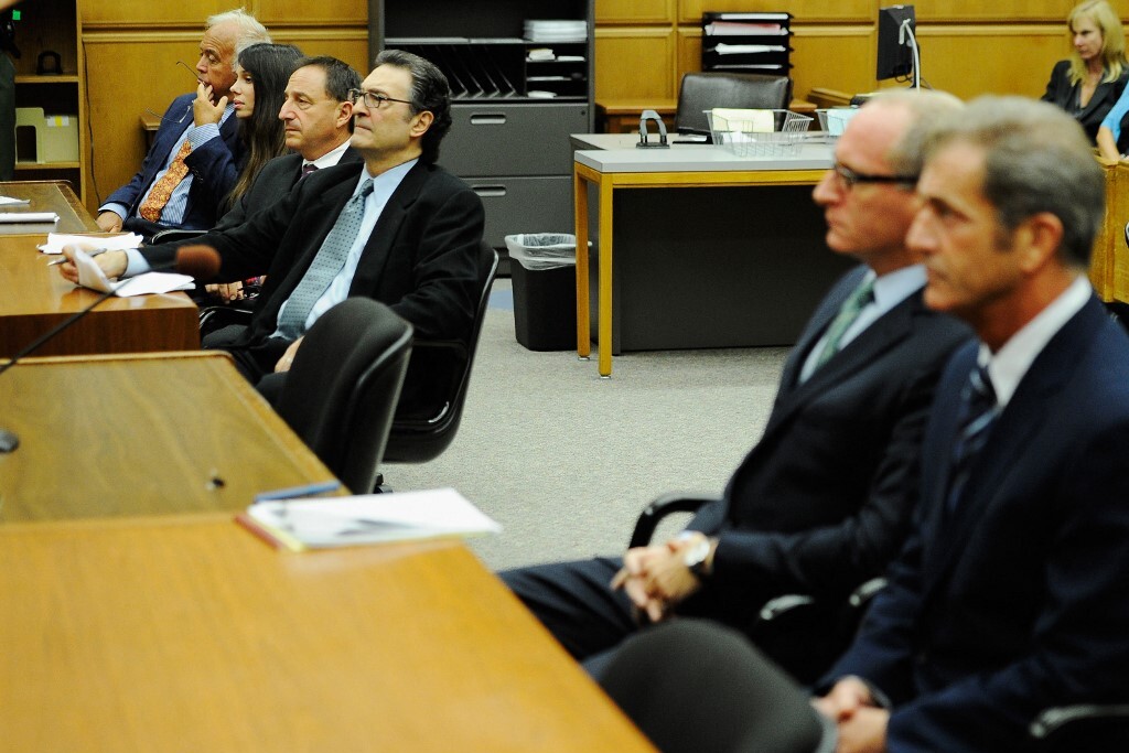 Oksana Grigorievával (2. b) a kapcsolata a bíróságon ért véget család belüli erőszak miatt