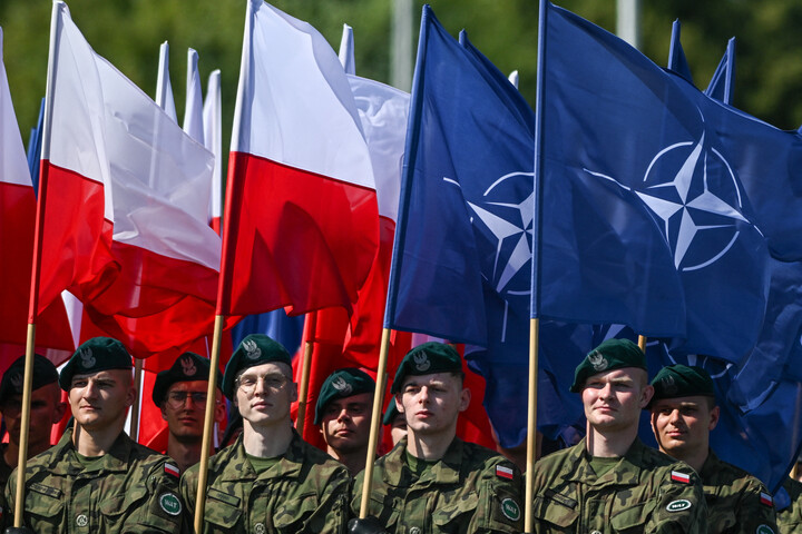 Fotó: NurPhoto via AFP/Artur Widak Lengyelország szerint migránsokkal támadják a NATO-t